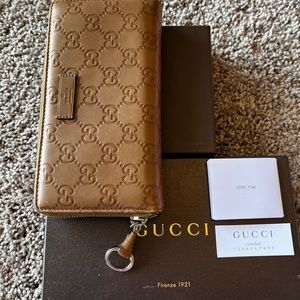 Authentic Gucci Guccissima embossed zip around wallet. Box included